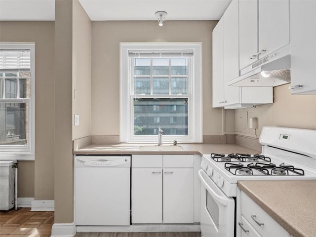 166 N Dithridge St Unit 3E, Oakland, PA 15213 - kitchen with white appliances, under cabinet range hood, light countertops, and white cabinets