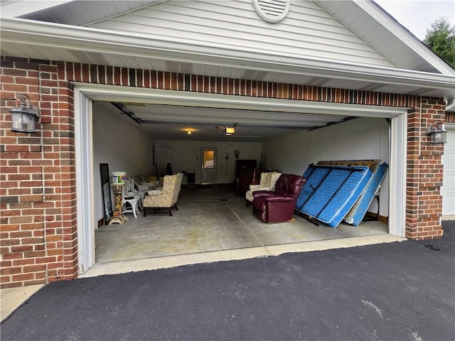 3205 Penny Ln, Neshannock Twp, PA 16105 - garage with asphalt driveway and a garage door opener