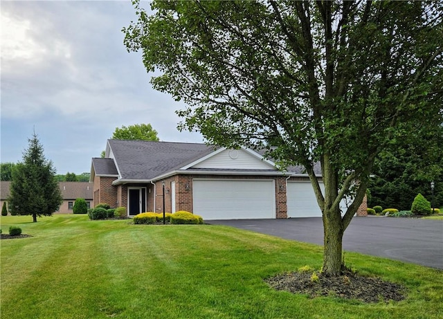 3205 Penny Ln, Neshannock Twp, PA 16105 - view of front of home featuring brick siding, an attached garage, a front lawn, and driveway