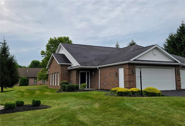 3205 Penny Ln, Neshannock Twp, PA 16105 - view of front of property featuring an attached garage, brick siding, driveway, a front lawn, and roof with shingles