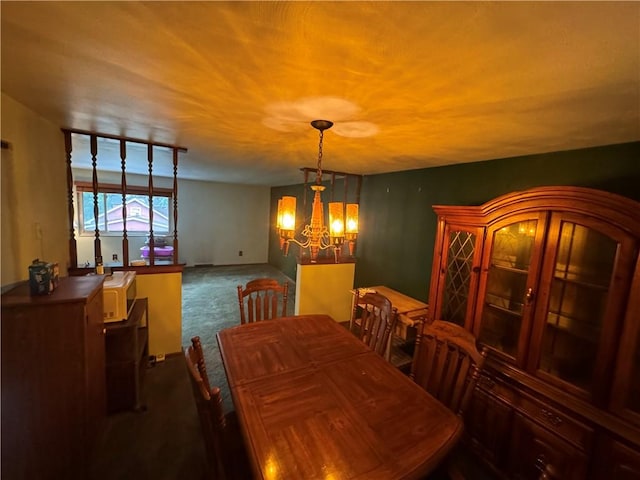 495 Pierson Run Rd, Plum Boro, PA 15239 - dining room with dark colored carpet and a chandelier