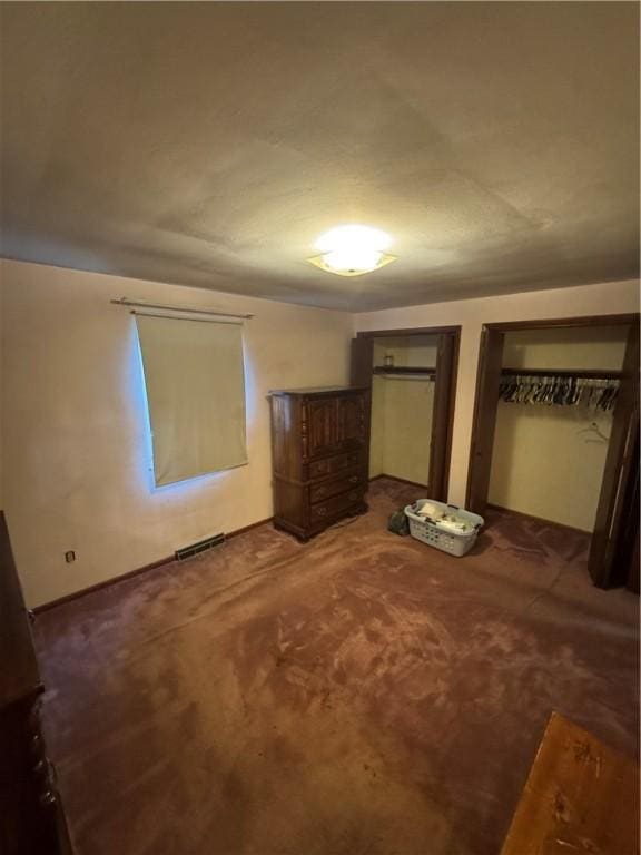 495 Pierson Run Rd, Plum Boro, PA 15239 - unfurnished bedroom with carpet and two closets