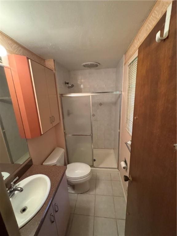 495 Pierson Run Rd, Plum Boro, PA 15239 - bathroom with vanity, a shower stall, and tile patterned flooring