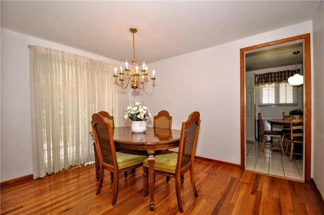 6437 Willem, Jefferson Hills, PA 15332 - dining area featuring a chandelier and wood finished floors