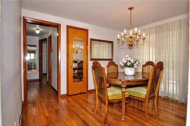 6437 Willem, Jefferson Hills, PA 15332 - dining space featuring a chandelier and wood finished floors