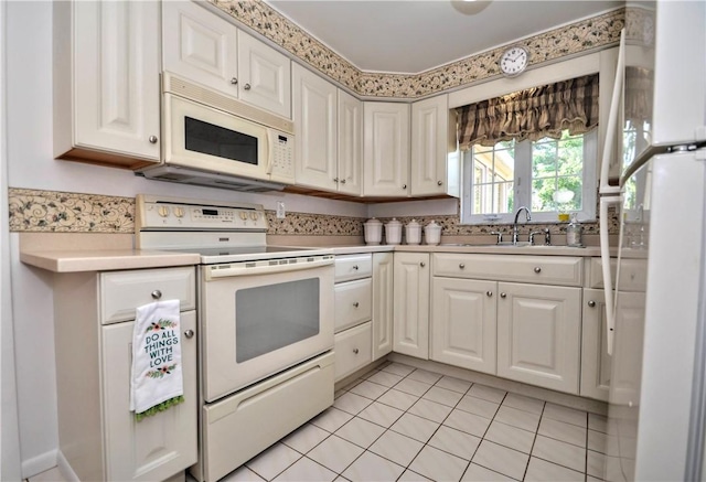 6437 Willem, Jefferson Hills, PA 15332 - kitchen with white appliances, light countertops, white cabinetry, and light tile patterned floors