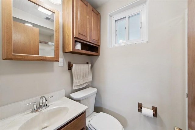 409 Westland Dr, Hempfield Twp, PA 15601 - bathroom with toilet and vanity