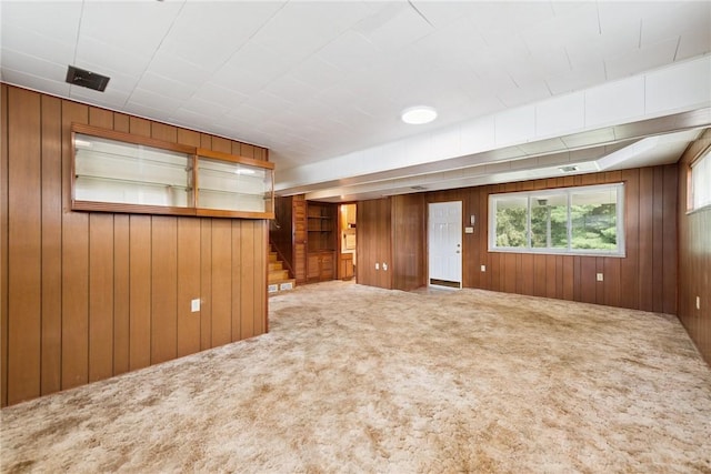 409 Westland Dr, Hempfield Twp, PA 15601 - carpeted spare room with stairway and wooden walls