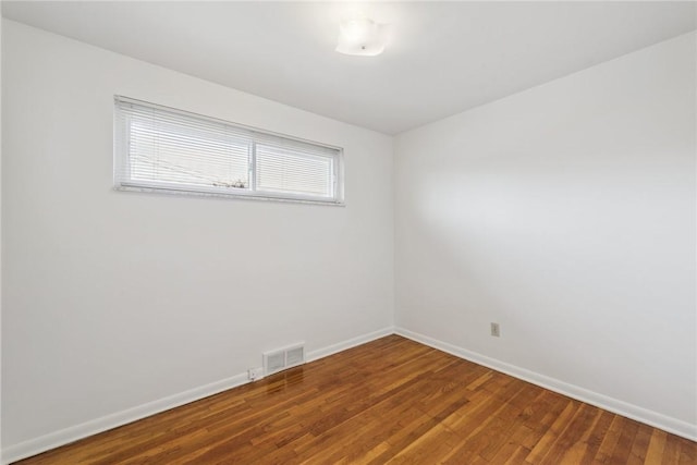 409 Westland Dr, Hempfield Twp, PA 15601 - unfurnished room with baseboards and wood finished floors