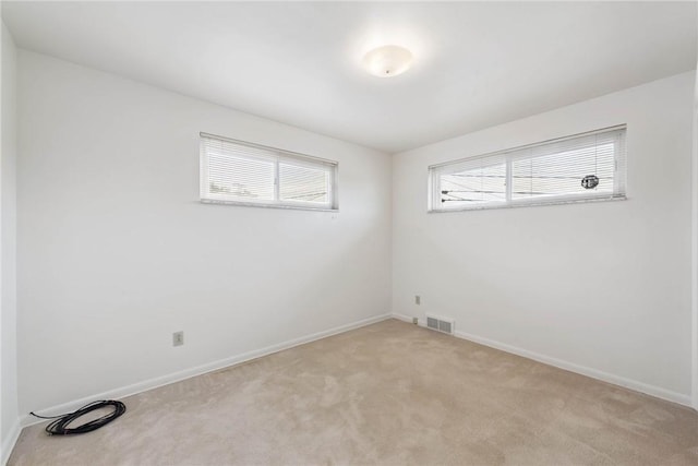 409 Westland Dr, Hempfield Twp, PA 15601 - empty room with light colored carpet and baseboards