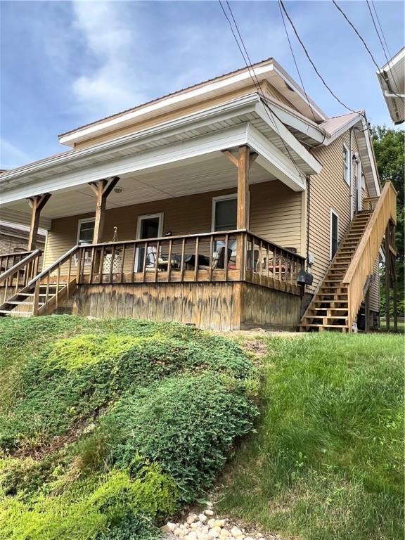613 Third St, City Of But Ne, PA 16001 - rear view of property with stairs