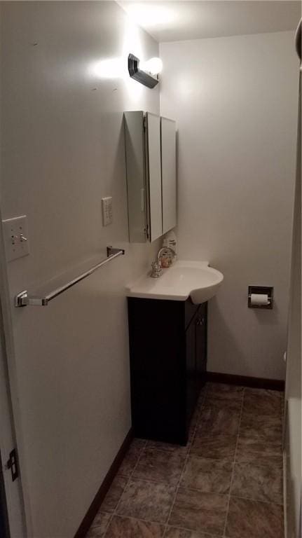 613 Third St, City Of But Ne, PA 16001 - bathroom featuring vanity and baseboards