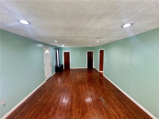 1023 Burtner Rd, Harrison Twp, PA 15065 - spare room with wood finished floors, a textured ceiling, and recessed lighting