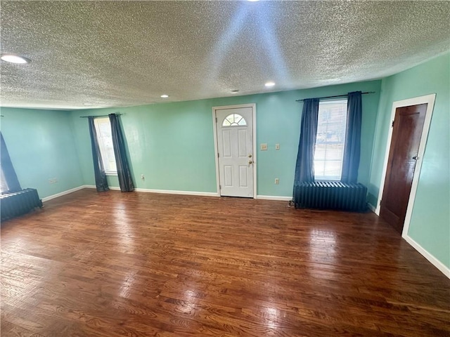 1023 Burtner Rd, Harrison Twp, PA 15065 - foyer entrance featuring a textured ceiling, wood finished floors, and recessed lighting