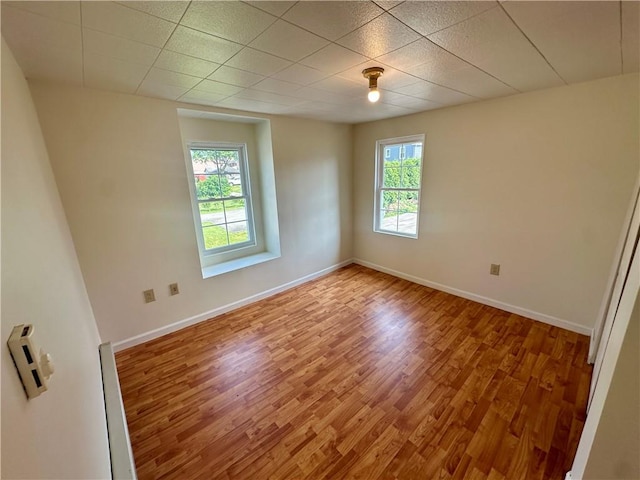1023 Burtner Rd, Harrison Twp, PA 15065 - spare room featuring wood finished floors and baseboards