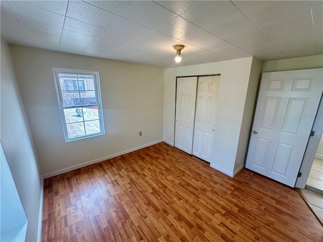 1023 Burtner Rd, Harrison Twp, PA 15065 - unfurnished bedroom with light wood-style flooring and a closet