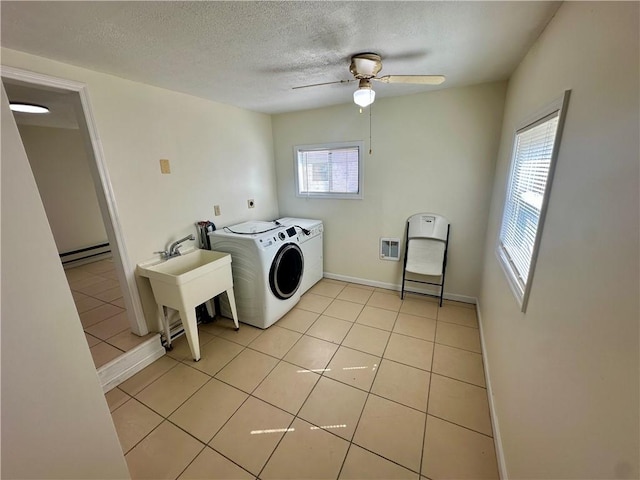 1023 Burtner Rd, Harrison Twp, PA 15065 - washroom with separate washer and dryer, a ceiling fan, a textured ceiling, and light tile patterned floors