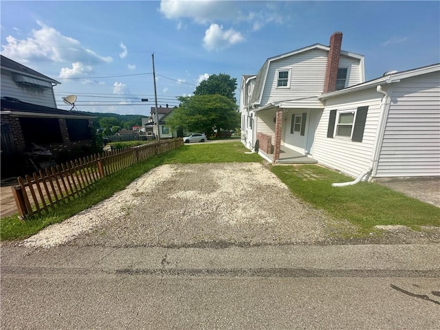1023 Burtner Rd, Harrison Twp, PA 15065 - view of side of home featuring a chimney
