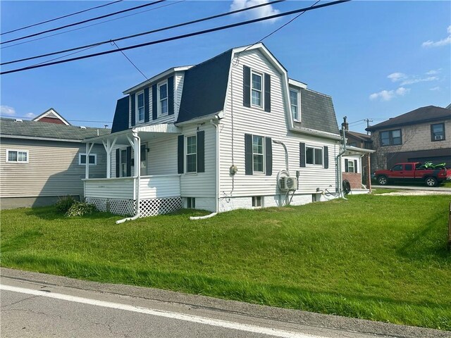 1023 Burtner Rd, Harrison Twp, PA 15065 - view of front of house featuring roof with shingles, a gambrel roof, a front yard, and a porch
