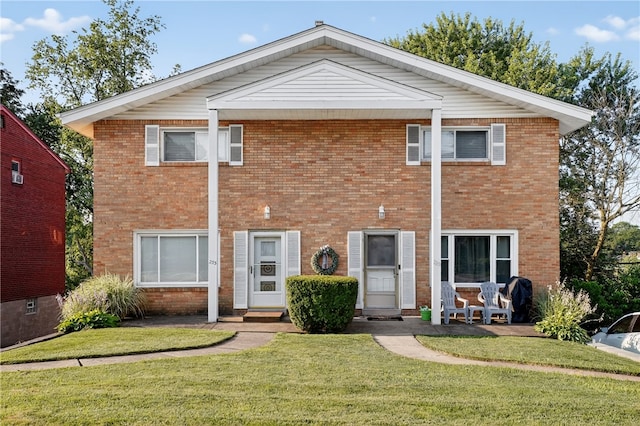 233 Ingram Ave, Ingram, PA 15205 - view of front facade with brick siding and a front yard
