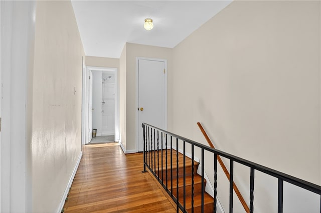 233 Ingram Ave, Ingram, PA 15205 - hallway with wood finished floors and an upstairs landing