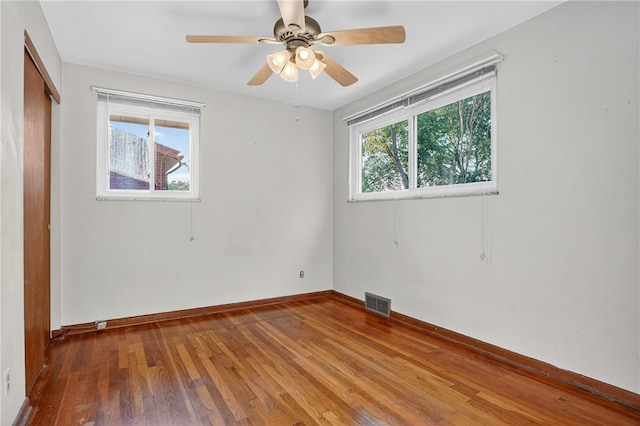 233 Ingram Ave, Ingram, PA 15205 - unfurnished bedroom with wood finished floors, a closet, and a ceiling fan