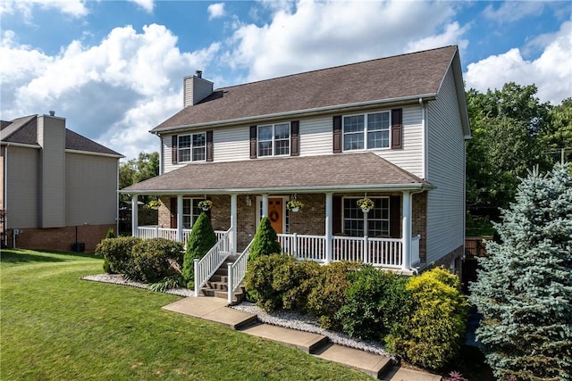 405 Crestridge Dr, Hempfield Twp, PA 15601 - view of front of house featuring a chimney, a front yard, a porch, and roof with shingles