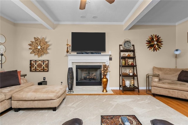 405 Crestridge Dr, Hempfield Twp, PA 15601 - living area featuring wood finished floors, a ceiling fan, ornamental molding, and a fireplace with flush hearth
