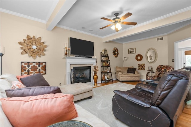 405 Crestridge Dr, Hempfield Twp, PA 15601 - living area with ornamental molding, ceiling fan, wood finished floors, and a fireplace with flush hearth