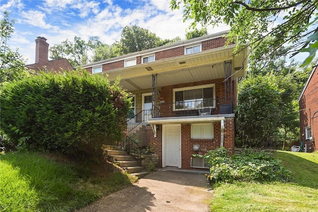 3905 Beechwood Blvd, Squirrel Hill, PA 15217 - view of front of house featuring brick siding, stairs, and a porch