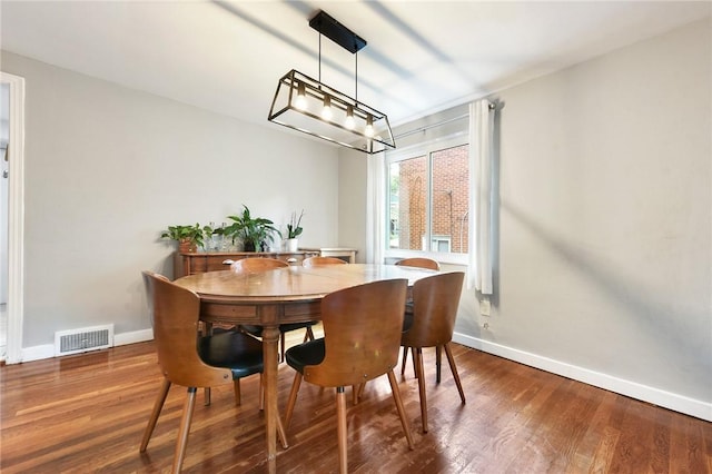 3905 Beechwood Blvd, Squirrel Hill, PA 15217 - dining space featuring a chandelier and wood finished floors