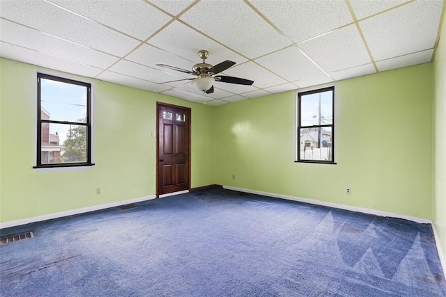 149 Frank St, Whitaker, PA 15120 - unfurnished room featuring a drop ceiling, plenty of natural light, carpet, and ceiling fan