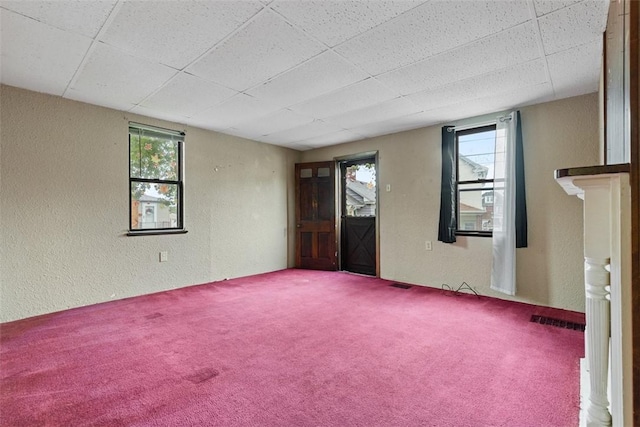 149 Frank St, Whitaker, PA 15120 - empty room with carpet flooring, a textured wall, plenty of natural light, and a drop ceiling