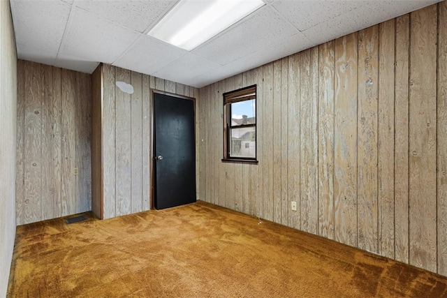 149 Frank St, Whitaker, PA 15120 - carpeted spare room featuring wooden walls