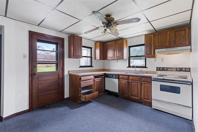 149 Frank St, Whitaker, PA 15120 - kitchen with white appliances, under cabinet range hood, light countertops, dark colored carpet, and a paneled ceiling
