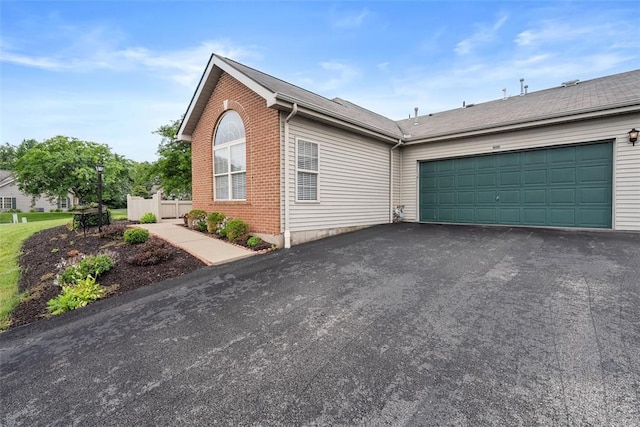 5113 Polo Fields Dr, Hampton, PA 15044 - view of side of property with driveway and an attached garage