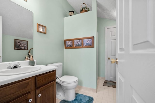 5113 Polo Fields Dr, Hampton, PA 15044 - bathroom featuring vanity, tile patterned floors, and a textured ceiling
