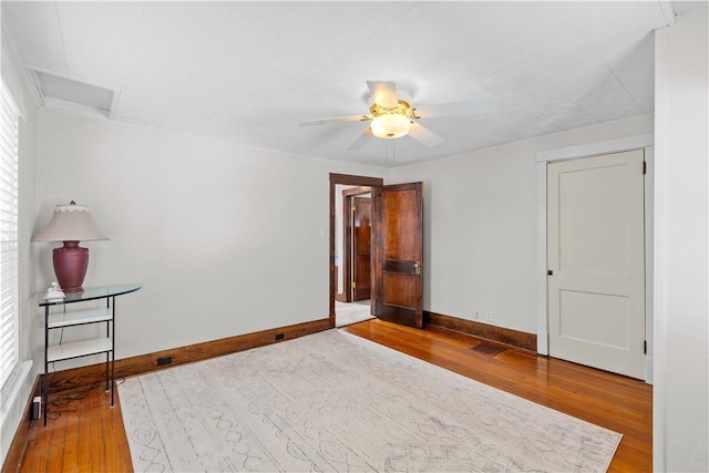 107 Braun St, Shaler, PA 15223 - unfurnished bedroom with hardwood / wood-style floors, attic access, and ceiling fan