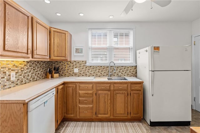 107 Braun St, Shaler, PA 15223 - kitchen featuring white appliances, light countertops, a ceiling fan, backsplash, and recessed lighting