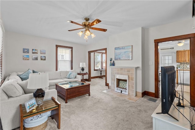 107 Braun St, Shaler, PA 15223 - living room featuring ceiling fan, light colored carpet, and a fireplace