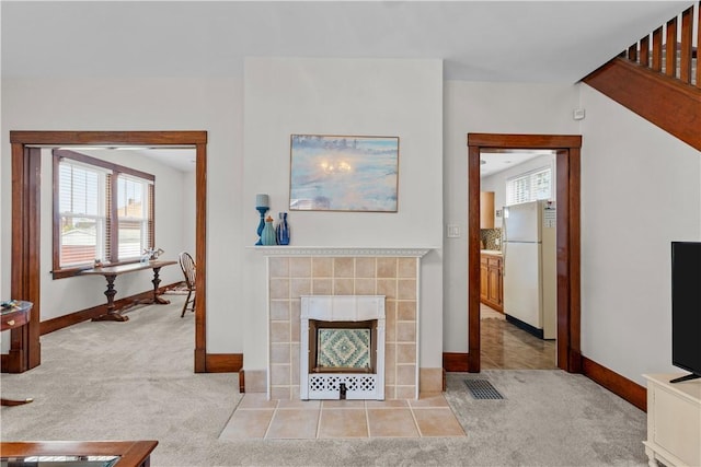 107 Braun St, Shaler, PA 15223 - living area with light colored carpet and a fireplace