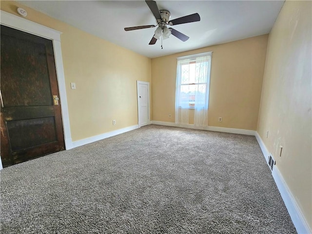 2001 7th Ave, Beaver Falls, PA 15010 - empty room featuring ceiling fan, carpet flooring, a smoke detector, and a fireplace