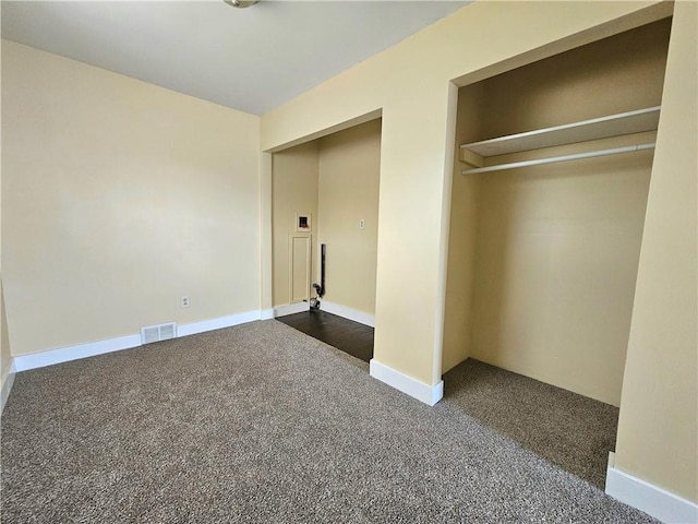 2001 7th Ave, Beaver Falls, PA 15010 - unfurnished bedroom featuring dark carpet and a closet