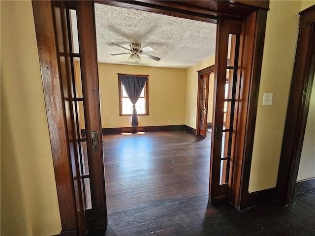 2001 7th Ave, Beaver Falls, PA 15010 - hallway featuring french doors, dark wood-style floors, and a textured ceiling
