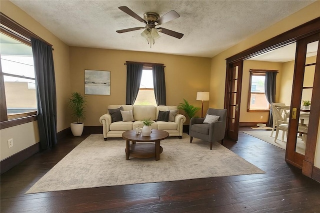 2001 7th Ave, Beaver Falls, PA 15010 - living room with healthy amount of natural light, dark wood-style floors, a ceiling fan, and a textured ceiling