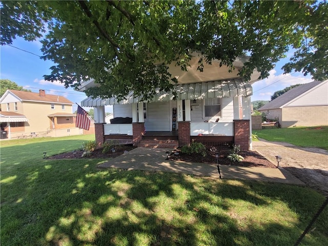 1727 Tyler St, Aliquippa, PA 15001 - view of front facade featuring a porch, brick siding, and a front lawn