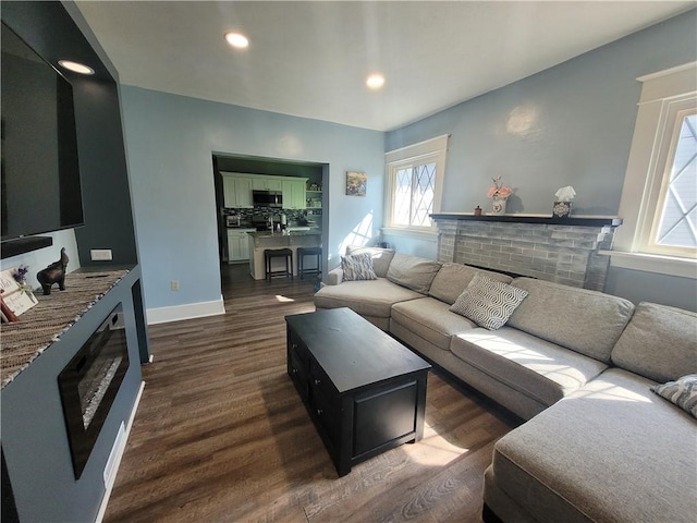 1727 Tyler St, Aliquippa, PA 15001 - living area featuring a fireplace, dark wood-style floors, and recessed lighting