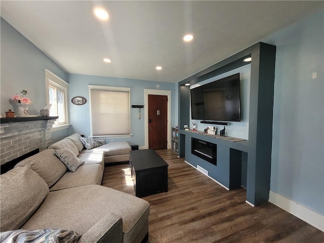 1727 Tyler St, Aliquippa, PA 15001 - living room with a fireplace, dark wood-type flooring, and recessed lighting