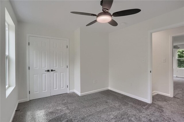 130 Center Ave, Burgettstown Boro, PA 15021 - unfurnished bedroom with carpet floors, a closet, and a ceiling fan