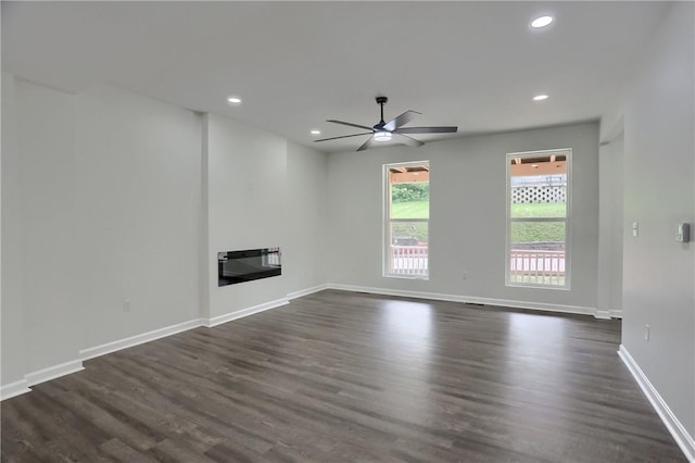 130 Center Ave, Burgettstown Boro, PA 15021 - unfurnished living room with ceiling fan, dark wood finished floors, a glass covered fireplace, and recessed lighting